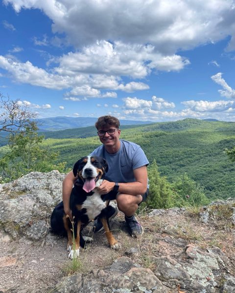 Martin with his dog on a hiking trail